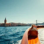Bosphorus daytime cruise with scenic views and historic landmarks in the background.